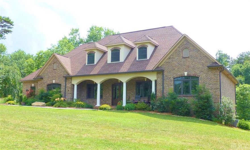 Private estate living right in the heart of Viewmont/Hickory on 1+ acres! New QUALITY custom built home in '10 which offers 3600+ htd sqft PLUS a full unfin lower level (plumbed)--which could easily be finished. Main level living at its best--gorgeous Brazilian cherry hrdwd flrs thruout (tile in baths/lndry) PLUS an upper level suite offering a HUGE BR (no closet), a full bath (granite top vanity) & a bonus rm w/a WIC.Upper lvl also has TONS of flrd attic storage areas (some walk-in) w/easy access. An impressive main lvl boasts 9'+ ceilings,extensive moldings,decorative columns,a relaxing covered front porch,an open flrplan, split BR plan (all BR's have ensuite baths).Formal LR & DR. Lrg grtrm/den w/a stone gaslog FP,custom blt-ins & access to awesome covered back deck--an outdoor living area. Kitchen is open & offers granite,lots of cabs, pantry, brkfast nk & bar area. MBR has tray ceiling & priv. MBTH (walk-in tile/glass shower, dual vanities w/granite + WIC.Just too much to mention!
