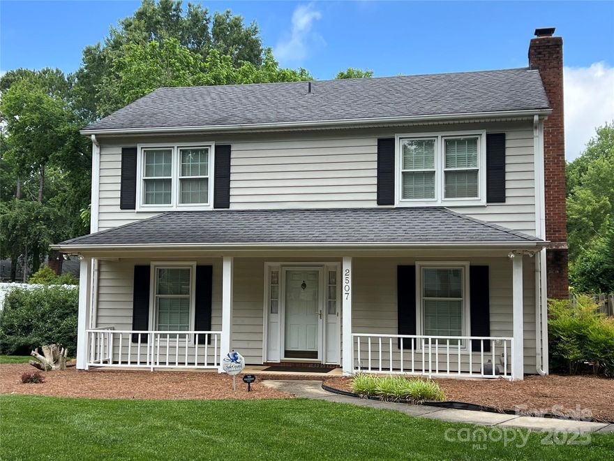 Welcome to this 3-bed, 2.5-bath home nestled in a quiet neighborhood of Charlotte. This charming two-story residence combines comfort, functionality, and curb appeal—perfect for anyone seeking a private retreat just minutes from city amenities. Step inside to discover a bright, inviting interior with spacious living areas. The main level features a warm and welcoming layout, ideal for entertaining or everyday living. Upstairs, you’ll find three comfortable bedrooms and two full bathrooms offering plenty of space for rest and relaxation. Enjoy your morning coffee on the covered front porch, or host gatherings on the brick patio that overlooks a beautifully landscaped backyard. The outdoor space is fully fenced for privacy and features mature trees, flowering plants, a dedicated shed for extra storage, and a small storage room on the back of the house. Don’t miss your chance to own this lovely home in one of Charlotte’s desirable communities! Property is being sold as is.