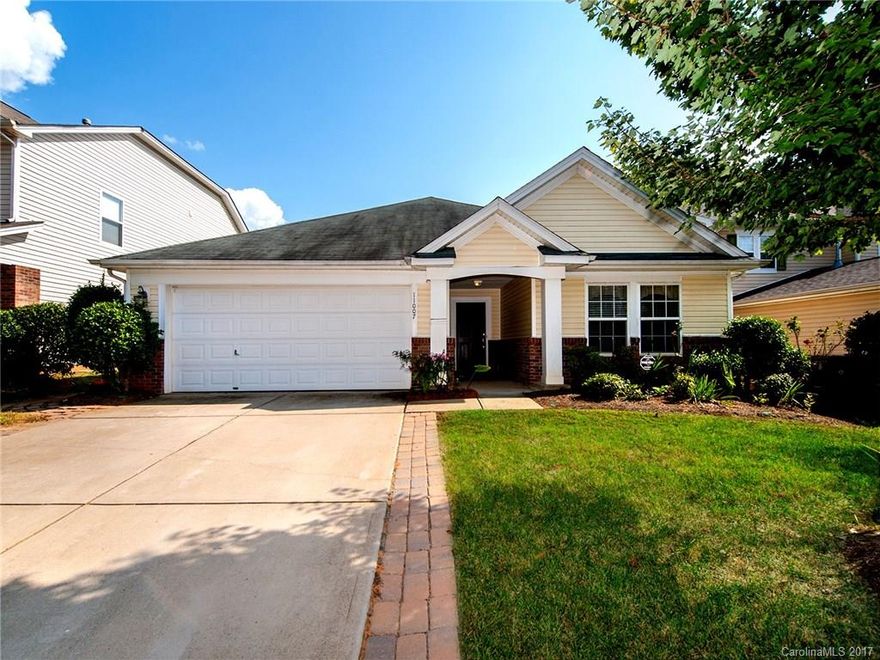 Gorgeous Ranch Home w/ an Open Floor-plan!  Home features hardwood throughout the Foyer, Formal Living  & Great-Room, Fireplace in Great room, Chef's Kitchen with Gas Cooktop and plenty of Cabinets and Counter Space.   Master suite with HUGE walk-in closet,  deep garden tub & separate shower.  Neighborhood offers Clubhouse, Pool, Playground, etc.  Great location, great amenities and truly close to everything; Outlet Mall, Restaurants, Harris Teeter, Pharmacy,  I-485, I-77, I-85, & much more.