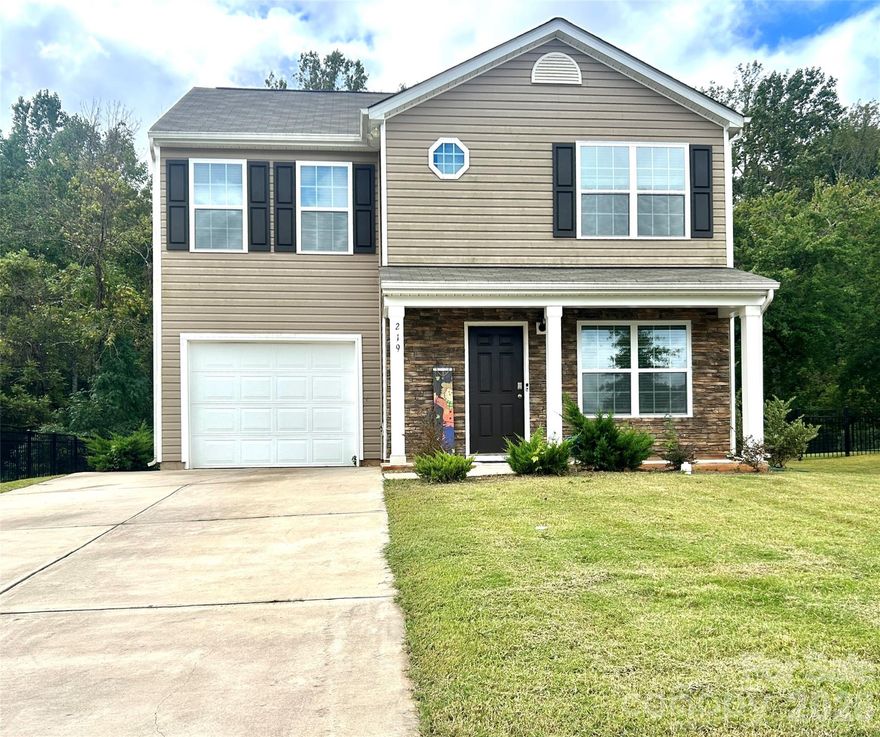 ****PRICE DROP!!!  Bring your clients back! **** 5 minutes from I85, easy access to Kannapolis, Concord and Charlotte!! Built in 2022, only one owner, vacant and still like new!  This move-in ready, 3 Bedroom, 2 ½ Bathroom is that of a great floorplan with expansive living room with fireplace.  Enhance the luxury vinyl flowing on the 1st floor and make the quiet carpeted bedrooms your sanctuary with your very own touches.  Step into the kitchen and dining area that is lit up with the sliding glass doors to the scenic, tree-lined backyard and patio.  Fully equipped kitchen features all stainless-steel appliances and gas cooking!  Ample contemporary granite countertops and cabinet space.  The front and back yards are just enough to easily maintain leaving plenty of time to enjoy it. Should you choose to completely fence in, only front sections remain.  The upstairs living quarters feature loads of natural light and a peaceful atmosphere to enjoy your quiet community.  Convenient laundry closet.  Oversized, private primary suite with vaulted ceilings, a spacious bathroom with dual vanity, walk-in shower across from the walk-in-closet.  Very nicely sized secondary bedrooms facing either side of the home, share their own large bathroom and nicely sized closets of their own.