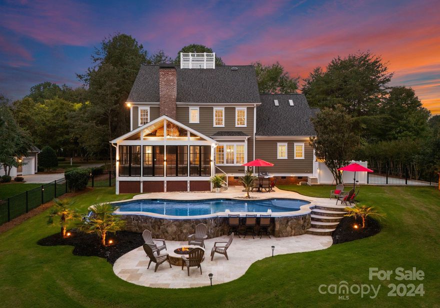 This beautiful Simonini-built home, located in Sconset Village a gated neighborhood within The Point, offers stunning year-round VIEWS of Lake Norman & has a DEEDED BOAT SLIP pier Z-70. The backyard is a private oasis featuring a new-2022 inground pebble tech saltwater POOL, gas fire pit, & large travertine patio. An outdoor shower & a newly built heated & cooled year-round porch off great room enhance year round living. A new roof 2024 with a transferable warranty & newly installed hardwood floors extended to the second level.

Inside, the home showcases crown moldings, & quality craftsmanship throughout. The main level includes a sunny eat-in kitchen w/ granite countertops &  butcher block island, great room w/ fireplace, Dining Room & flex room currently serving as a fourth bedroom w/ potential to convert the half bath into a full bath. The owner's suite features a private office or gym space, luxurious bath &  walk-in closet. Two additional large bedrooms share a Jack & Jill bath