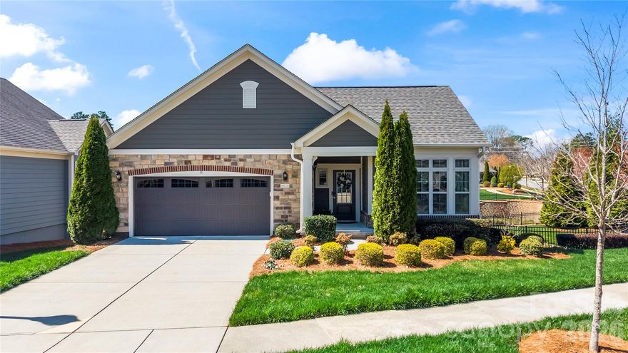 Welcome to this beautiful ranch home with a fully finished basement, located in the active adult Epcon community. As you enter, you’re greeted by a versatile flex space—perfect for a home office, workout room, or hobby area. The home then opens into a thoughtfully designed kitchen featuring quartz countertops, a farmhouse sink, gas range, and a large island with additional seating and storage, all flowing seamlessly into the dining area. The main-level primary suite offers a walk-in closet and an ensuite bath with a double vanity and walk-in shower. New carpet was installed in the primary and in the primary closet in 2025. Just off the primary, enjoy peaceful pond views from the screened-in porch. A secondary bedroom on the main level includes access to a balcony, while an additional full bath and a convenient laundry room with utility sink complete the main floor. The fully finished walk-out basement expands your living space with a spacious family room, a guest suite with a full ensuite bath. The basement also has a utility closet for additional storage. Step outside to enjoy serene pond views from the lower level as well. Another notable update is that the entire exterior of the home was repainted in 2025. Residents enjoy access to community amenities including an outdoor pool, clubhouse, and fitness center. Ideally located just minutes from Birkdale Village (~2 miles), Lake Norman (~1 mile), The Cain Center for the Arts (~4 miles), as well as shopping, dining, and more—this home truly has it all.