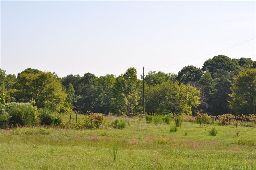 This beautiful stretch of land located in Clover, SC features big open spaces as well as wooded areas. Great location not too far from White Water Center, Nature Preserve, Hiking trails, and downtown Clover. Mobile home, water wells and fuel tanks on property all convey. This property is perfect for a family wanting to build, farming or investors.