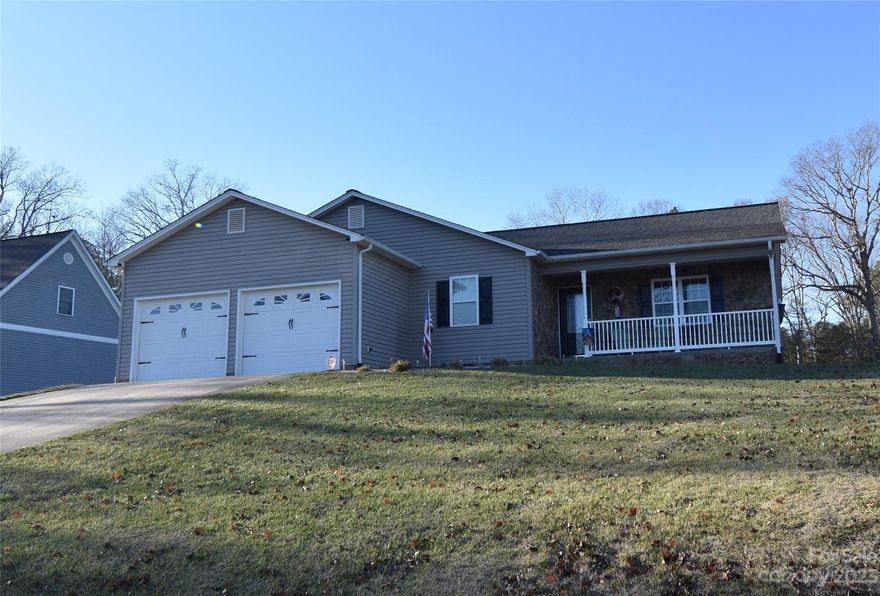 Clean and Well maintained 3 bedroom, 2 bathroom One Level Home in Anns Way Subdivision. This home features an Open Living and Dining room with Gas Logs Fireplace and Valted Ceilings. The kitchen has oak cabinets, Gas Range, Microwave, Dishwasher and Refrigerator. The dining room leads out to a Sunroom that has new windows installed. Primary bedroom has a large walk-in closet and a full bathroom with a double vanity sinks plenty of space. Out building with power purchased since sellers purchased the property.  Well maintained yard. Two car garage with shelving for additional storage. All one level living. Call today for a showing!