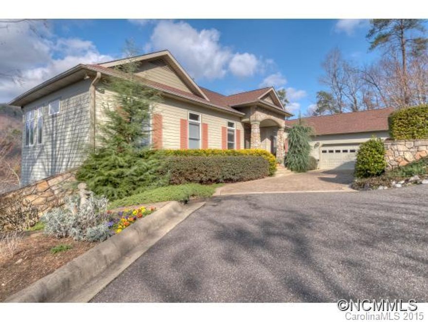 CUSTOM 5000+ sq ft LAKEFRONT Estate Home of Craftsmanship Details and  Elements. LAKE and MOUNTAIN VIEWS from every room. Double Lakeside Decks. Dramatic Entry. Soaring Ceilings, Mesquite LR Floor. Brazilian Rosewood on Curved Staircase. Handcrafted Oak Beamed Ceiling in Den. 2 fireplaces. Master Spa Bath-Heated Floor. ELEVATOR. Heated Resistance POOL. 5-Zone Heating. Workshop with dust control. Generator. Trolley to Boathouse. Pro Landscaping