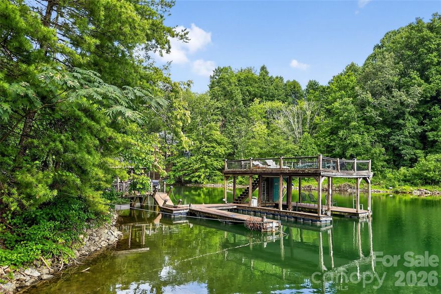 With approximately 500 feet of water frontage, a double-decker floating dock with two slips, a waterfront screened and covered gazebo, this truly wonderful piece of property sits ready for you build your dream home on. Owners have owned for nearly 30 years. Mallard Pointe only has 38 home sites. Tucked back in its own cove in a no-wake zone, the waters of Lake James sit at your feet, perfect for swimming, boating, bonfires, dinners in the gazebo - you name it. The lot is one of a few on Lake James that is nearly flat from the road to the water - you don't get that in the mountains. With underground high speed internet now in the neighborhood and power already running the distance of the lot all the way to the gazebo and dock, you have everything you need here to live out your mountain lake fantasies.