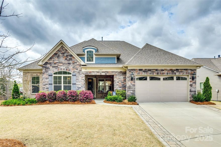 Located minutes from nearby shopping, entertainment and schools, this meticulously maintained home is situated on a premium cul-de-sac lot and has extensive upgraded finishes throughout. The beautifully landscaped and low maintenance backyard with patio, firepit, sitting wall, landscape lighting and screened-in porch are perfect for relaxing and entertaining guests. The primary bedroom is located on the main level and has an expansive walk-in closet, attached sitting room, and spa-like bath. Two additional bedrooms on main level have walk-in closets and a shared bathroom.  Upstairs includes a fourth bedroom, a full bath, an additional loft space and a walk-in attic for storage.  The spacious kitchen flows seamlessly into the great room, breakfast nook, and dining room.  Includes two separate office spaces on main floor plus a full smart home package with built-in Sonos speakers.  The finished garage has epoxy flake floors and a 240v EV outlet. This is one that you do not want to miss!