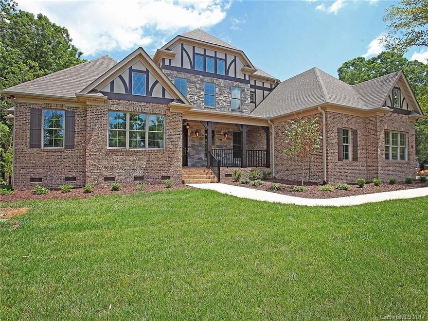Beautiful brick & stone construction with a low maintenance exterior, 30 yr Architect. shingles, Pella efficient Alum. Clad windows w/LowE glass. Custom front door. Brushed nickel finishes. Spray foam energy saving insulation. Upgraded interior trim. Moen plumbing fixtures. Master bath w/jetted tub, heated floor, custom tile. Custom Kitchen cabinets, Stainless Kitchen Aid Appl., upgraded granite countertops. Prestigious Stanton Hts moments to Uptown & Ballantyne! Some photos virtually staged.