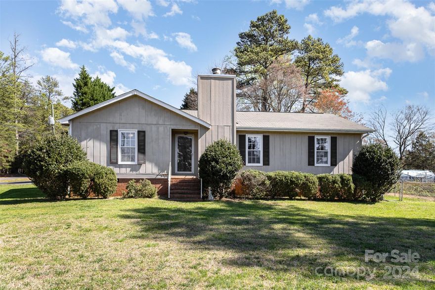 Enjoy this split bedroom ranch style home on a corner lot in Southwest Charlotte so close to the highly desirable Palisades Community. Enjoy saving a lot of money paying absolutely no HOA costs. The fenced in back yard has features a flat lot, a deck, and a large storage shed with power. Enjoy living so close to entertainment and recreation with Lake Wylie and Carowinds close by.