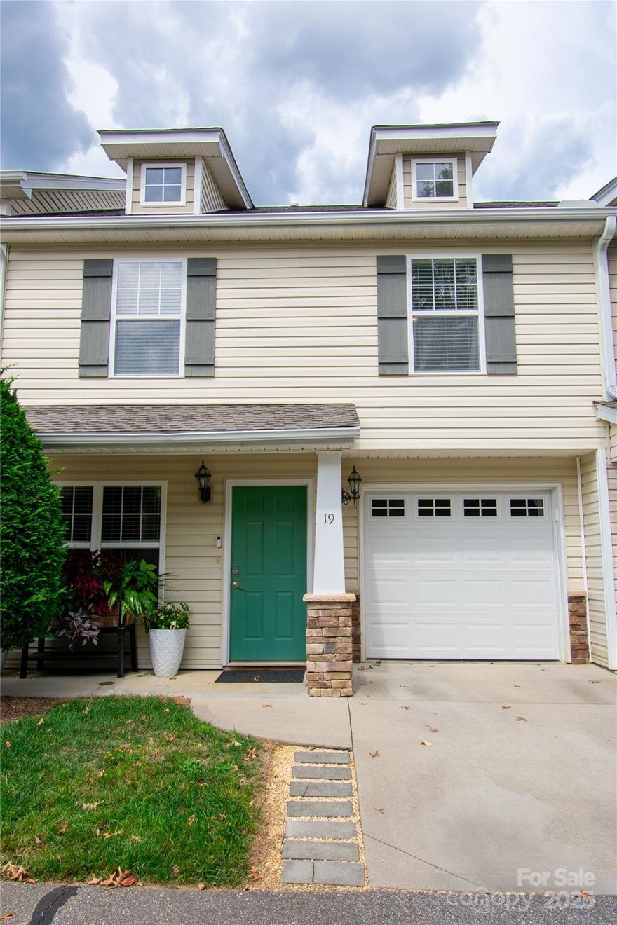 Wonderfully maintained 3 bedroom 2.5 bath townhome in Fletcher.  Conveniently located between Asheville and Hendersonville, this home makes access to shopping, restaurants, Fletcher Park, and the airport a breeze. The primary bedroom has plenty of storage with two closets and a full bath.  Outdoors you will find a covered front patio and in back another space perfect for making s'mores or a barbeque. For those loving low maintenance, the HOA covers lawn care, exterior care, and trash pickup. The garage is easy access to the kitchen for bringing in groceries or creating your own home gym space. Come and envision yourself living in this well-kept home!