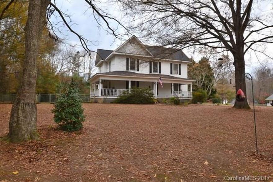 Come own a piece of history in Rock Hill.  This home is over a 100 years old.  Such a grand home with wide open foyer for a grand entrance.  Great entertaining home with beautiful hardwood floors and unique features that only an older home can offer.  The kitchen is huge and offers lots of cabinets and work island.  Large bedrooms with one being on main level.  Lovely wrap around front porch and a fenced area for the animals. Great location, large lot.  This is an AS IS SALE.