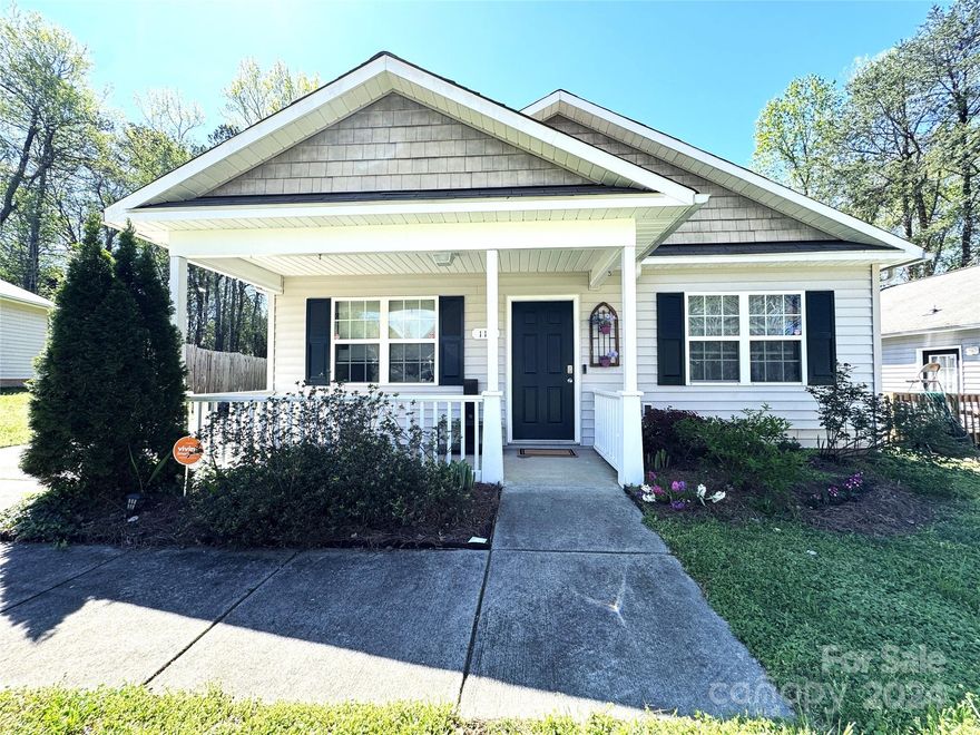 This Mooresville one-story offers  Bright  right wide open ranch plan with move in ready. Large, level lot backing up to wooded acreage. Good size front porch in a one street neighborhood. Storage building in back, Fridge, washer and dryer remain too. It's hard to find a property in this price range, in such good condition as this one, so you will want to see it.