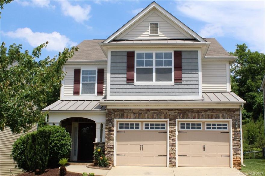 Fabulous 3 Bedroom, 2.5 Bathroom home with the Master Bedroom on the main. Cozy & comfortable. Attractive hardwoods, new carpet, fresh new paint.  Eye-catching front with plenty of windows. Large kitchen with island and loads of counter space. A landscapers delight, ready for flower beds and planting. Neighborhood amenities include Club House, Playground, Pool & Walking Trails.  Located near I-485, an easy commute to Uptown Charlotte and all points North.  Move in Ready!