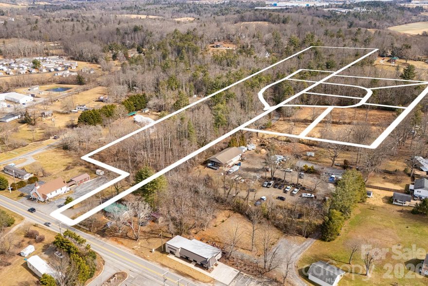 Located in highly desirable Mills River, this exceptional 8-lot minor subdivision offers a rare opportunity for builders and developers alike. Featuring large, level homesites ranging from 0.69 to 1.30 acres, the property blends open pasture and mature woods to create a private yet convenient setting.  The plat has been recorded with minor subdivision approval from the Town of Mills River, and each lot has been successfully perked with permits in place making this project truly ready for construction.  Ideally positioned close to all that Mills River has to offer, with quick access to South Asheville, Asheville Regional Airport, and Pisgah National Forest, this development combines accessibility with the peaceful character buyers are seeking. Level topography, privacy, and infrastructure groundwork already complete, a strong foundation for your next build.