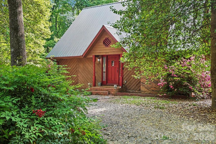 Tucked away in the woods on approximately 2.38 acres, this 3-bedroom, 2-bath home offers privacy and space in a peaceful setting. A fenced yard and half-circle driveway add both function and curb appeal. The main level features a primary suite with an ensuite bath, while two additional bedrooms and a full bath are located upstairs. Inside, you’ll find an open living room that flows into a formal dining area and a horseshoe-style kitchen complete with custom-built cabinets. The partially finished basement provides an additional space for an office, study, and a separate room for entertainment. Includes a one-car garage and laundry area, offering additional flexibility and storage. Fenced yard and nice side deck for relaxing. A rare opportunity in Davie County—this home is full of potential and priced to make it your own.