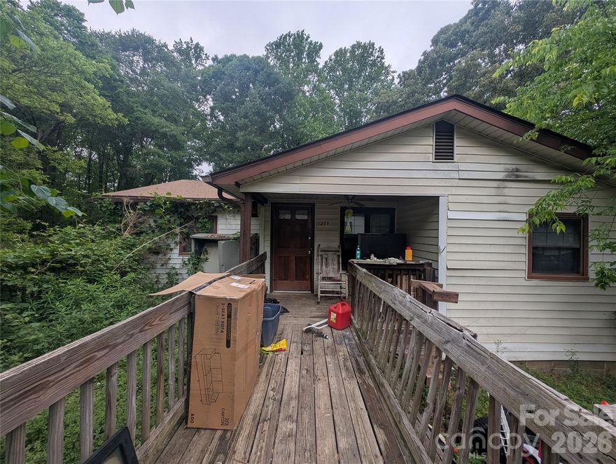 Investor opportunity with tons of potential! Situated on approximately 1.35 acres, this home offers a unique opportunity for investors, or builders looking to create value. The property is conveniently located just minutes from Interstate 85 and close to downtown Gastonia, providing easy access to dining and local amenities. The home is in need of renovation and is being sold as-is. In addition to the existing home, there are two additional empty parcels included. This is a court-ordered sale and is subject to a 10-day upset bid period. Please do not disturb the occupants under any circumstances. All showings must be scheduled.