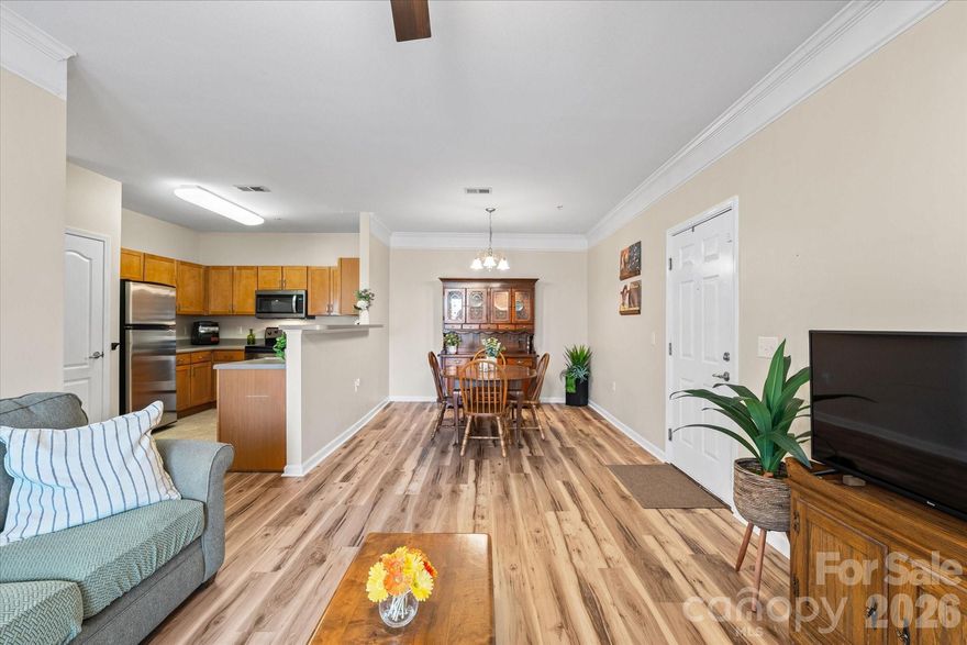 Enjoy easy, low-maintenance living in this well-maintained 2-bedroom, 2-bath condo in the popular Grove at Appeldoorn community, ideally located in South Asheville just minutes from Biltmore Village and downtown. This perfectly maintained, clean home offers an efficient layout and brand new flooring throughout the whole condo! The open living and dining area flows easily into the kitchen, complete with great stainless steal appliances, excellent cabinetry, ample counter space, and a breakfast bar. The primary suite includes a private bath with a walk-in shower, while the second bedroom and full guest bath provide flexible space for guests, family, or a home office. Step outside to a covered patio, perfect for morning coffee or relaxing evenings. Also includes a storage closet and a separate laundry closet complete with washer and dryer for maximum convenience. Residents enjoy walking trails, picnic area, and plenty of parking. Here's your chance to own an affordable unit in a quiet, well-kept community right in the middle of everything Asheville has to offer.  Book your showing today!