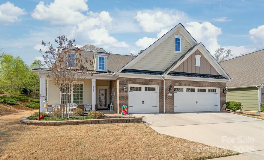 EXQUISITE DECOR & UPGRADED to the MAX! "Summit" Garland plan-One Level Ranch on Private Lot in Gated Community! As you enter this Home you will Immediately Sense how Special this Home is! Heavy Moldings Added, Hardwood Flooring Throughout w/Tiled Floors in Baths & Laundry. Plantation Shutters Throughout. Upgraded Light Fixtures & Fans. NEWLY Rebuilt Fireplace Wood Casement w/Stone Surround & New Mantle. Fabulous Coffered Ceiling in Primary Bdrm! Closet System in Primary Walk-in Closet w/Pull down attic. Built-in Cabinetry-Great Room, Office, Bedrm 3 & Laundry. "Gourmet" Kit w/Double Convect Ovens & Gas Cooktop. Under & Upper Cabinet Lighting, Subway Tiled Backsplash, Single Bowl Sink, Walk-in Pantry. Quartz Counters All Full Baths & Laundry. Bdrm 2 Has Direct Bath Access. Finished Garage w/Pull Down Attic added. Irrigation System, Tankless Water Heater. WOW!  Expanded Glass Enclosed Vaulted Porch w/several Glass Sliding Doors to Paver Patio. Totally Private Lot backs to Common area.