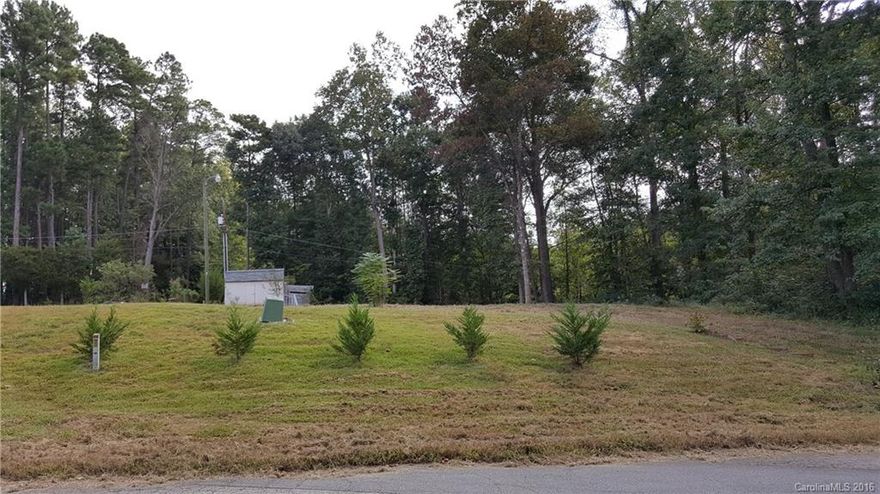 GREAT LOCATION. Nice private lot near the end of cul-de-sac. Very close to Interstate I-85 George W Liles Parkway and  Afton Village. Rare opportunity as zoning official states double-wide manufactured home allowed. Well, electric and shed on site included as is. City of Concord official states there is sewer and water at the road.