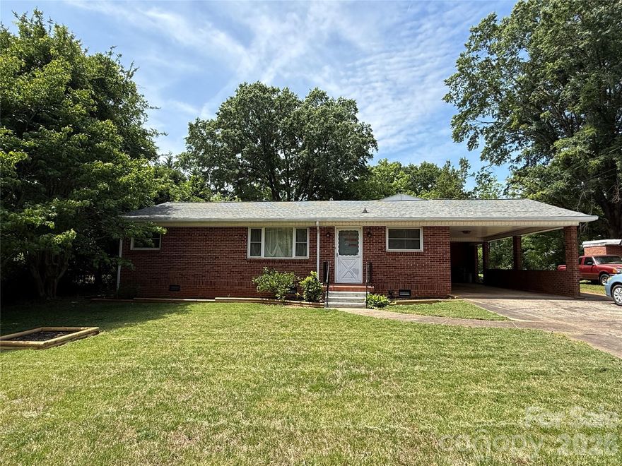 All-brick charm meets modern updates in this inviting 3-bedroom, 1-bath home. Inside, you’ll find original hardwood floors paired with durable ceramic tile, creating a warm and timeless feel throughout. The updated kitchen features brand-new cabinets and stainless steel appliances, offering both style and functionality.

A standout feature of this property is the additional building, 26 x 36  providing endless possibilities—whether you’re looking for extra living space, a workshop, or a private business setup. This space is heated, with its own bathroom

Enjoy the convenience of a 1-car carport along with a sense of privacy that doesn’t sacrifice proximity to nearby amenities. This versatile property is full of potential and ready to fit your needs.