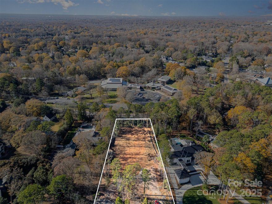 Rare opportunity to own a 1.35-acre lot in the desirable SouthPark area. This cleared, flat, and wooded lot is primed for your dream home. Ideally located, it offers convenient access to shopping and dining options. A prime property in one of the area's best locations.