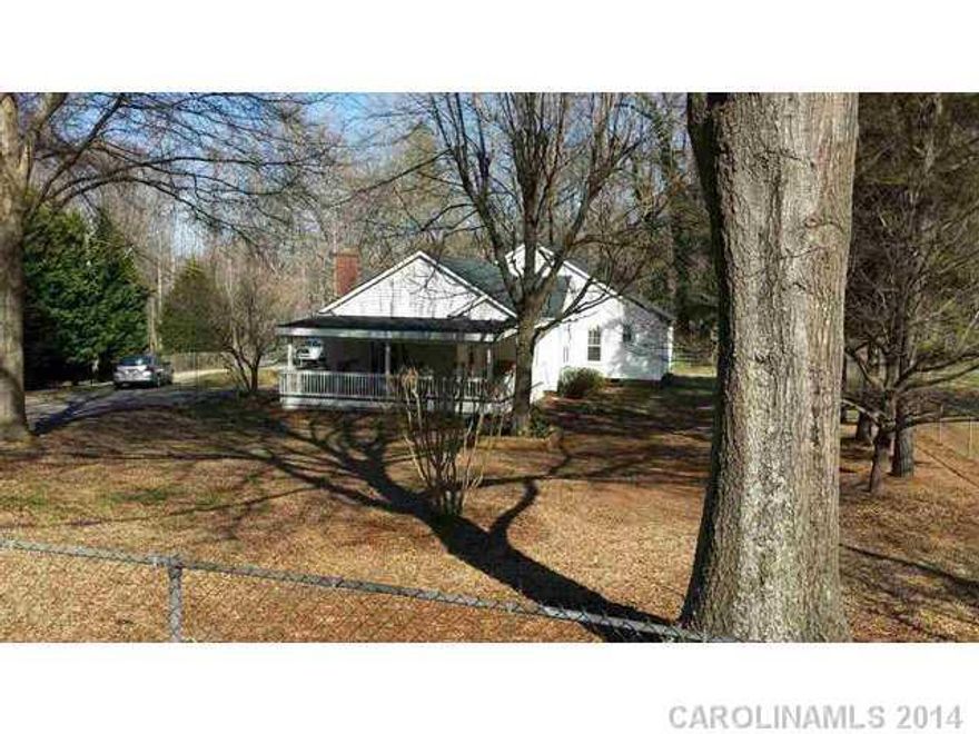 Built in 1955 with huge Master BR added in 1996 with baulted ceiling, new wiring, new roof, charm of older home. Open LR/DR concept. Large screened back porch, rear deck, detached workshop, concrete drive. Easy and quick access to I77.