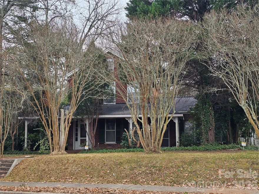Step back in time and discover the timeless charm of this one-of-a-kind century home. More than 100 years of historic character await a new owner who will appreciate the hardwood floors, the mahogany staircase handrail and the sunbaked brick that's part of the interior charm. But can also add their own personal touches to the home. The large yard offers a private area for relaxing and entertaining. The home is within walking distance of downtown.
