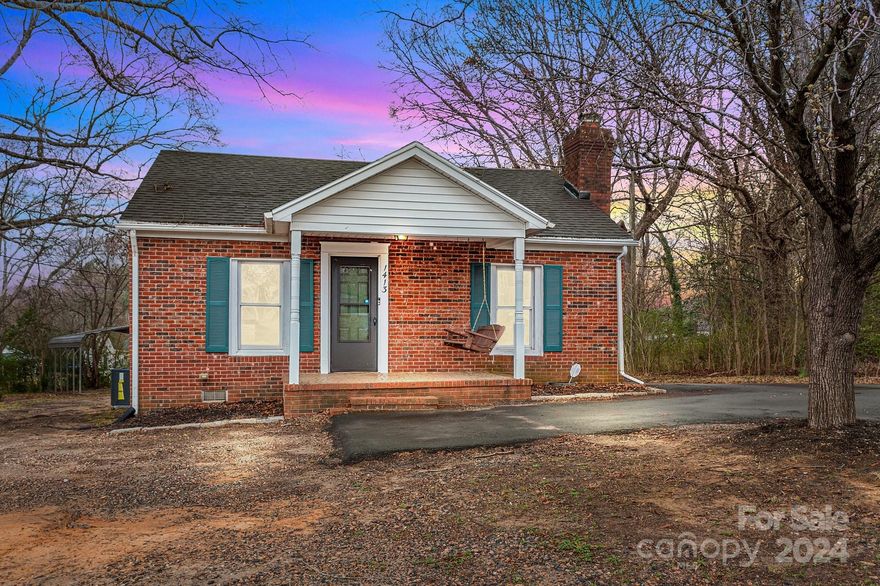 Welcome to this 2 bedroom, 1 bathroom home conveniently located just minutes from Downtown Kannapolis where you can explore the revitalized area featuring popular restaurants, boutiques, shops, and the Cannonballer Stadium. You'll love the layout with the living room, dining room, and kitchen all open for easy entertaining and every day functionality. The bedrooms are nicely sized with a large walk-in closet in one bedroom and access to the oversized deck from the secondary bedroom. The yard includes a circle driveway for easy entry and exit and a detached 2 car garage with electricity plus a 2 car carport for extra parking. You'll enjoy Baker's Creek Park and  Village Park being close by for year round activities. This is a perfect starter home or someone looking to downsize! Schedule your showing today!