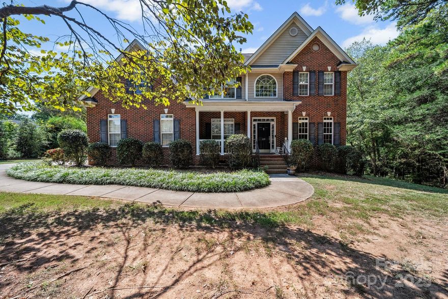 Welcome to this charming two-story home in the desirable Fort Mill area, set on over an acre with a private, tree-lined backyard and direct access to a walking trail. The vaulted entryway opens to a main-floor office, while updated finishes make the home move-in ready. Recent updates include a freshly painted interior (2023), renovated primary bath (2023), renovated upstairs full bath (2022), and new LVP flooring in the primary and nursery (2022). The kitchen features stainless steel appliances—fridge, oven, and microwave less than 3 years old. Enjoy the expansive back deck overlooking wooded views. Four bedrooms offer flexibility, with one easily used as a bonus or office. Community amenities include equestrian facilities and walking trails. Located in the award-winning Fort Mill school district, this peaceful retreat offers both luxury and convenience, just minutes from shopping, dining, and top-rated schools. Don’t miss this opportunity in an established neighborhood with so much to offer.