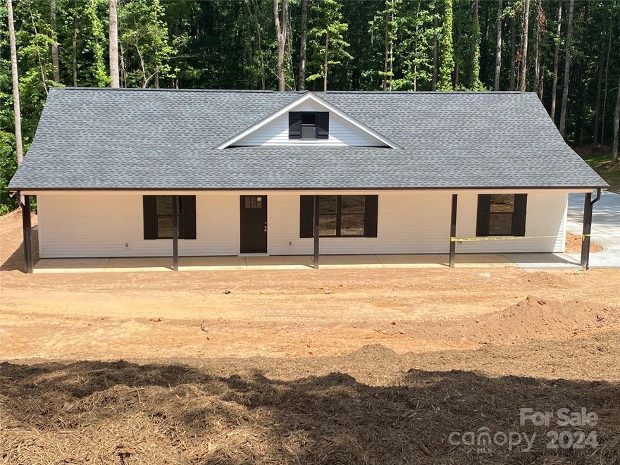Quality new construction sitting on 1.46 acres situated perfectly between Clover and Lake Wylie! This build features hardy plank siding, an oversized attached two-car carport, and a concrete driveway! The inside flows perfectly as the main living space and kitchen are open and inviting. The Kitchen features white cabinetry, granite tops, and stainless appliances. The flooring in the main living spaces is LVP, with alabaster walls, on a split floor plan. The Primary suite features an en suite with tile flooring and a tile shower! The opposite side of the home features two guest rooms that share a full bath! Hurry, this amazing home won't last long!

*PHOTOS ARE RENDERINGS ONLY NOT OF THE ACTUAL HOME*