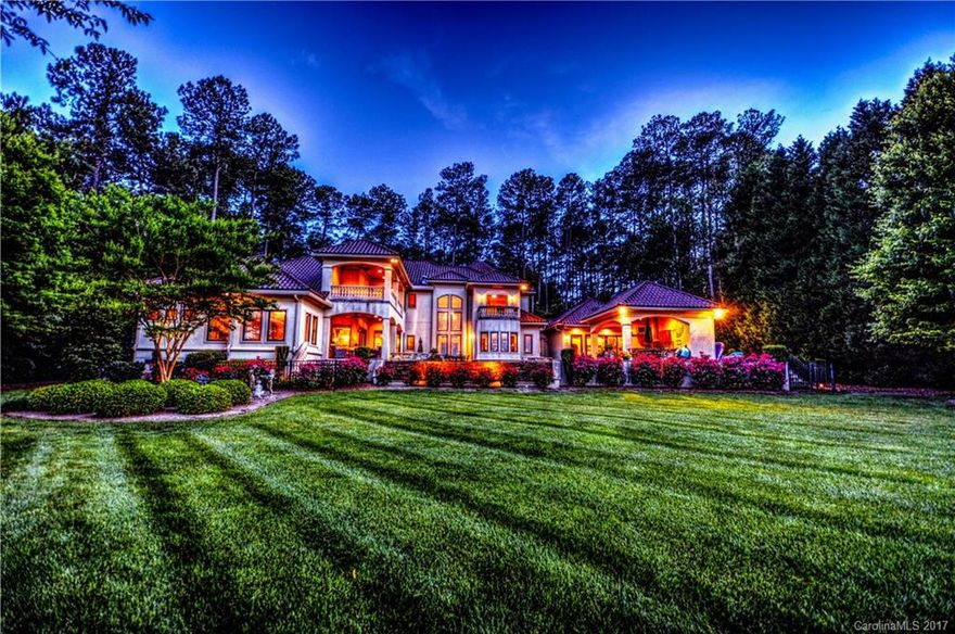 Waterfront Estate... Privacy, elegance & comfort...on almost a FULL ACRE LOT! This is not just a home, it's a lifestyle. Close to DOWNTOWN CLT and the TRIAD. Breathtaking Views in almost every room 2 story foyer, Travertine Tile floors, stunning custom kitchen, study, office and a fabulous GREAT room are just a few of the things that await you inside...Outside boasts a saltwater infinity pool and hot tub...cabana kitchen...new dock, and much more...DO NOT MISS THIS LAKEFRONT GEM!