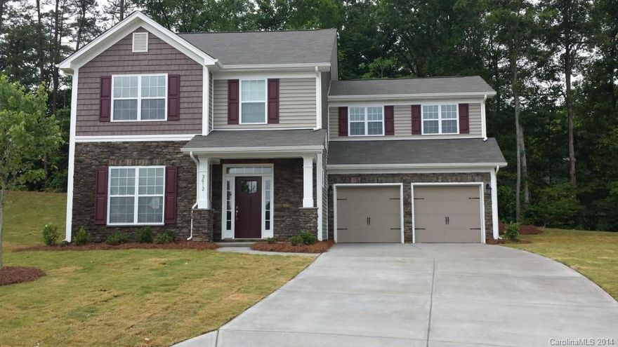 This home has a Lot of Premiums and features.  Yes, there is a Formal Dining room, Hardwoods down, Heavy Trim & Molding, Family room w/Fireplace that's open to the kitchen which has Granite w/tile backsplsh, Gas range pkg. and SS appliances.  Second floor has 4bdrms w/Plenty of room & Large closets. The Master Bedroom has a Cathedral ceiling, walk-in closet and a Master Bath w/separate Garden Tub & Shower. Pictures are representative. Ask about our incredible incentive options. Ready Jan/Feb