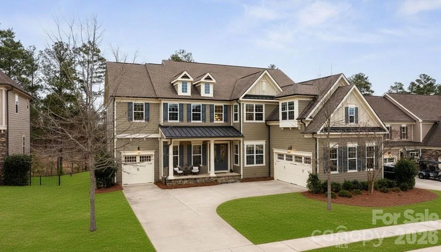 Located on the 11th hole in the gated Montage section of the premier Palisades community, this stunning home offers luxury living on a private, tree-lined golf course homesite at the end of a quiet street that flows into a cul-de-sac. Freshly painted throughout the interior, the home features custom light fixtures, beautiful wood floors, and a dramatic two story foyer highlighted by a winding wooden staircase.

The vaulted great room is filled with natural light from floor to ceiling windows and anchored by a striking stone fireplace. Just beyond, the chef’s kitchen is truly the heart of the home with a wooden hood vent, gas cooktop, quartz countertops, cabinet under lighting, and an oversized island perfect for gathering. A butler’s pantry with glass cabinetry and custom backsplash connects the kitchen to the formal dining room, creating a seamless space for entertaining. Step outside to the expansive screened porch with Trex decking, overlooking a private backyard complete with a paver patio and built in outdoor grill.

The main level also includes a dedicated office with French doors, coffered ceilings, and a closet, along with a guest suite featuring a full bath. Upstairs, the spacious primary retreat showcases dual walk in closets, a custom light fixture, and a spa inspired bath with a large tiled walk in shower, soaking tub, and dual vanities. Four of the six bedrooms include en suite baths, offering comfort and privacy for family and guests alike. A huge bonus room provides flexible space for a media room, recreation room, additional bedroom, or secondary living area.

With six bedrooms, five and a half bathrooms, a three car garage, and ample driveway parking, this exceptional golf course home combines elegant design, thoughtful upgrades, and an unbeatable location within one of the area’s most sought after communities. Residents enjoy close proximity to Lake Wylie and McDowell Nature Preserve, as well as the option to join The Catawba Yacht Club. The Palisades community offers championship golf at the Club at Longview, resort-style pools, tennis and pickleball courts, a fitness center, walking trails, playground, vibrant social events, and clubhouse dining overlooking the course. This is an opportunity to experience refined golf course living with exceptional amenities both at home and throughout the community!