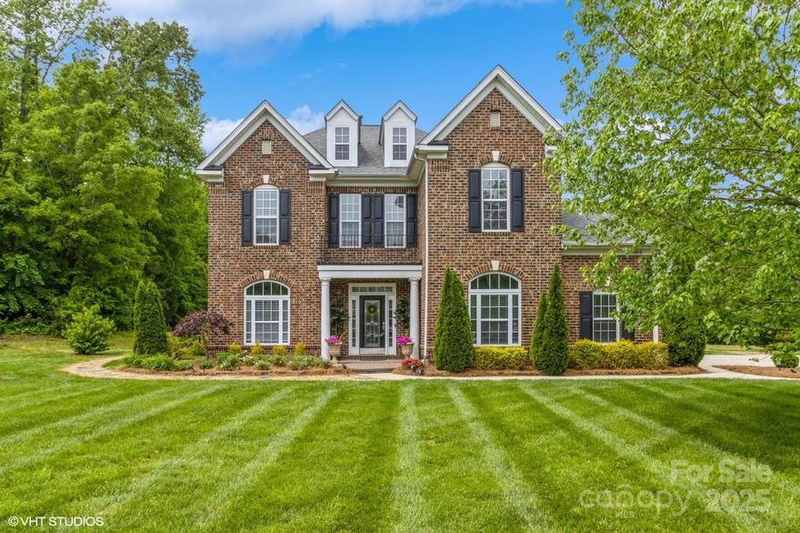 Beautifully maintained 5BR/4.5BA home on 1.37 acres in a sought-after community! The fully fenced, level backyard features a hot tub, fire pit, shed, and plenty of space to entertain or unwind. Main level offers two living rooms, a sunroom, formal dining, breakfast room, and a spacious kitchen with SS appliances, island, walk-in pantry, and abundant storage. A main-floor bedroom (used as an office) and full laundry room complete the space. Upstairs, the primary suite has two walk-in closets, a whirlpool tub, and separate shower. Three additional bedrooms include en-suite baths—two with walk-in closets. Major updates: roof (2021), downstairs HVAC (2021), upstairs HVAC (2024). Community amenities include clubhouse, pool, playground, and a fishing pond. Located just down the street from Marvin Ridge High and Middle schools, minutes to shopping and dining, and only 15 minutes to I-485. Rare combination of space, privacy, updates, and top-rated schools!