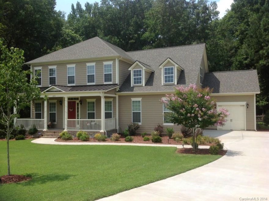 Fabulous Spacious Floor plan on a large wooded lot.  Low maintenance fiber cement siding. A must see! Master on main, two kid's suites off their own playroom, guest suite and a rec room (currently a media room) up! A kitchen any chef would be proud of and a jumbo deck that any outdoor griller would love. Beautiful 5" hand scraped hardwood flooring the entire main level except for the master bedroom, laundry & master bath. Granite counters in kitchen and all baths. Much more!!