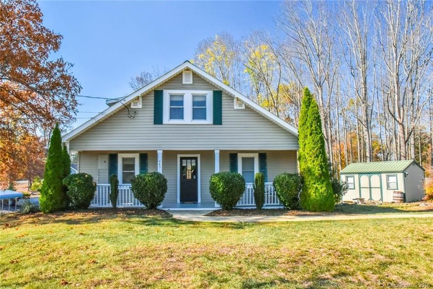 Enjoy this adorable bungalow located on a half acre lot.  Entertain guests in your open kitchen, living room and large deck.  Original hardwood floors and beadboard walls and ceilings.  This home has been updated but still has original old charm.  Total sq footage does not include upstairs with 3 bedrooms due to low ceilings.  Large fenced yard for gardening and a great place for dogs.   Minutes to downtown Weaverville.Make an appointment today!