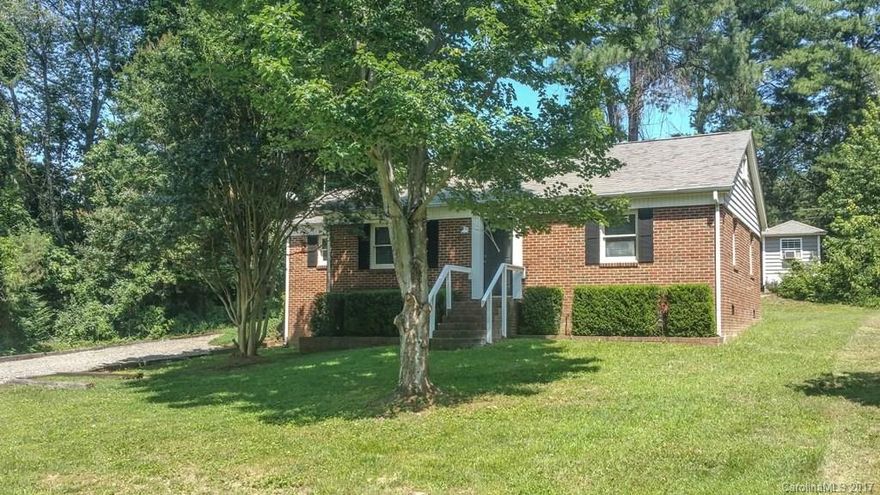 Live at the lake for less than you could rent.   Affordable lake living, located on a waterfront peninsula close to two marinas.  Adorable home with great layout, nicely updated cabinets, stainless steel appliances, and updated flooring...no carpet.  New HVAC.  Nice yard with large deck and storage building.  As of the time of listing, it's the lowest price in Mooresville, on the lake side, West of I-77!   Low taxes, 2016 real estate tax bill was only $732.  USDA eligible- 100% financing.