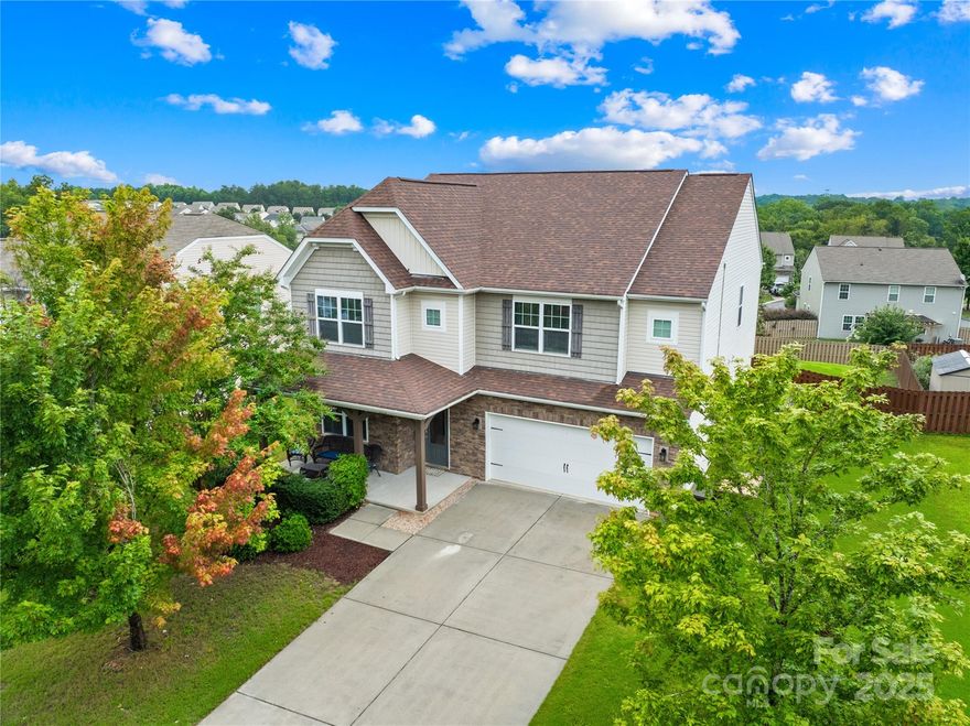 Located in the desirable Almond Glen neighborhood, this spacious 5BR/4.5BA Lennar-built Grisham model offers the perfect blend of comfort, style, and functionality. Just minutes from the new Ballantyne Bowl and all that South Charlotte has to offer, this two-story home features an open floor plan with a formal dining room, home office, and guest suite on the main level. You'll also find a large kitchen with breakfast area, family room with gas fireplace, and a half bath. Upstairs includes an oversized loft, a luxurious primary suite, three additional bedrooms with walk-in closets, a laundry room, and three full baths. Enjoy outdoor living in the private, fenced backyard—perfect for relaxing or entertaining. The community pool is a short walk away. Major updates include: HVAC (2025), roof (2022), solar system (2022—reducing electricity bills by ~75%), and new LVP/carpet (2023). Easy access to I-77, I-485, shopping, dining, and more. Don’t miss this incredible opportunity!