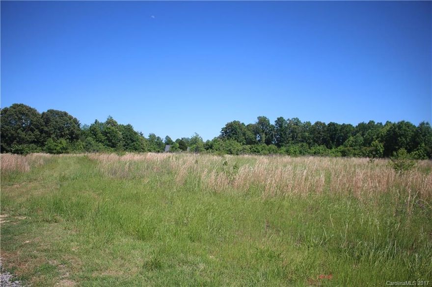 25.37 acres available in fast growing Locust. Consists of 3 parcels, 557401289222, 557401277654, & 557401381196. Zoned GR & NR w/an estimated 18.84 usable acreage. Remaining acreage could be used for open space requirements. The 3 parcels back up to 2 fully developed subdivisions. Water & sewer lines run to the property line. Attached maps aren't approved & are estimations of what could be potential usable acreage. Information should be verified/confirmed w/the Locust city zoning department.