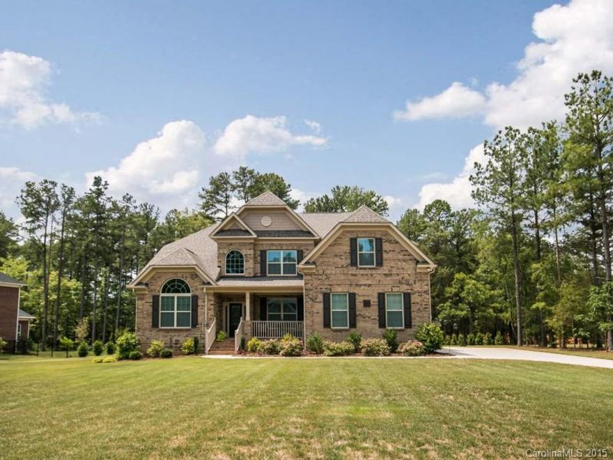 2 story All Brick w/ 3 Car Garage! Private, landscaped yard w/ irrigation sys. Features: 9ft ceiling, hardwoods, crown molding & recessed lights in main living areas! Vaulted, Trey & Coffered ceilings add elegant touch to home! Formal Dining w/ wainscoting. Gourmet Kitchen w/ granite, tile backsplash, island, breakfast bar, Butler's Pantry & gas cooktop! Family Rm w/ FP. Office. Lg Master Suite w/ sit area, granite, WIC. All BDRMs w/ WICs. 5th BDRM/BNS. Media Rm. Great Deck! Perfect Location!