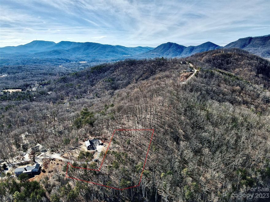 Offering 2.86 acres of unrestricted mountain land located in Columbus NC, located just 12 minutes from downtown Saluda, 25 minutes from downtown Hendersonville, and 25 minutes from Lake Lure. Half of this property is steep however the other half lays great for someone looking to build a mountain house with no restrictions and with incredible long-range views.