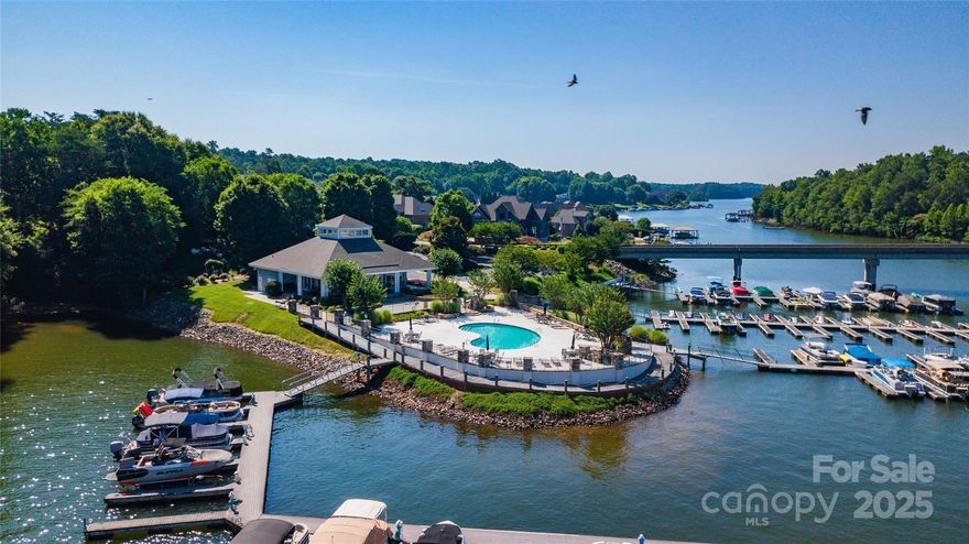 Private, wooded lot in Lake Norman planned community Windemere that includes assigned boat slip, lake front community pool, and clubhouse.  There is a tennis court and storage lot available for boat trailers and RVs.  Small community of about 130 lots near Lake Norman State Park.  The park is so close that you can walk or bike to its many trails and natural beauty.  By boat, there are 4 restaurants within a 15 minute boat ride.  The pool is beautifully landscaped and has open water views of the lake and boat docks.  The community is approximately 30 years old and there are only a handful of lots left undeveloped.  This is a rare opportunity to purchase a lot in Windemere.  Located 5 minutes from the town of Troutman and 15 minutes from Statesville and Mooresville.  Don't  miss this chance to be on Lake Norman at a fraction of the cost of lake front property while enjoying the beautiful amenities that this community offers.