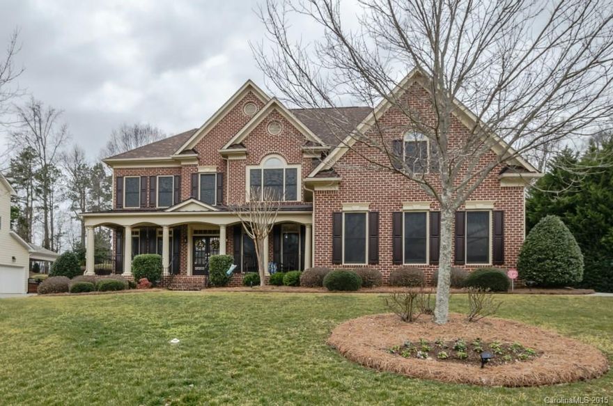 2-sty brick frt home w/ huge aluminum fenced yard w/ irrigation. Red Oak hardwoods t/o main floor. French doors to living room. Heavy moulding, arched entryways, transom windows add to custom feel! Guest ste on main floor w/ full bath. Kitchen features desk area, granite counters, tile back splash, 42" custom cabinets, island with bar seating! Noritz tankless water heater & whole house filtration.New carpet t/o 2nd floor. Master ste up w/ sitting room, cathedral ceiling, dual closets & office.