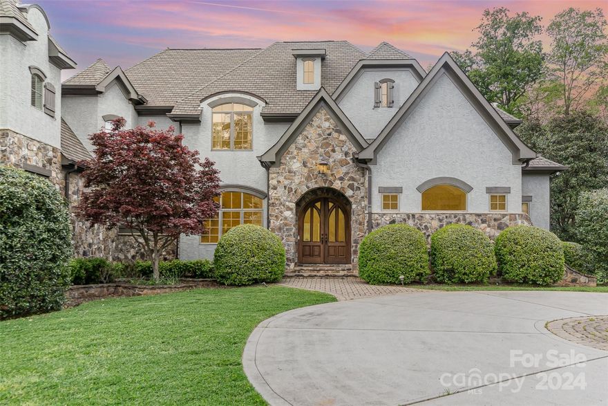 Welcome to the most enchanted castle located in the gated Stillwill neighborhood! This 4 BR, 5.5 BA with bonus and theater room is absolutely breathtaking! From the moment you walk in the door, admire the Pre-Civil War heart pine hardwood flowing throughout the home, gorgeous chiseled slate stone flooring throughout kitchen, hall and laundry! A Luxurious chefs kitchen featuring custom cabinets, commercial grade Thermador appliances, 6 burner stove with smooth griddle. Granite countertops and large walk in pantry. Primary bedroom with cathedral and tray ceilings. Over Two acres of lush fully irrigated landscaping. Primary bedroom also has his and hers full bathrooms, walk in closets and wine cooler/bar. Textured walls downstairs and extensive solid stone walls outside. 3 Car Garage with plenty of storage. Travertine floors around pool house with screened in porch. Updated with all Brizo plumbing fixtures and three tankless water heaters.