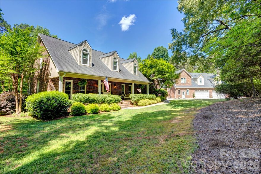 A rare one-of-a kind estate property in Cabarrus County!  Hard to find multi-generational home featuring three distinct fully equipped living spaces, plus the potential for a fourth.  Beautifully set on 2.43 acres at the end of a cut-de-sac, this home is surrounded by lush trees and offers so much privacy, yet so convenient to Hwy 49, Concord and Charlotte.   When you enter the home you will be struck by the open floor plan that has an amazing 18 foot stone fireplace as its focus.  Spacious and open, you will find the entry, family room, kitchen and dining area perfect for gatherings and entertaining year round.  The home also offers a main level primary suite in addition to a fully integrated 2nd living quarters.   The 2nd living quarters is totally private with its own fully equipped kitchen, cozy den, large bedroom, accessible full bath and an office/den area tucked away and accessed by a spiral staircase.  It even has its own screened in porch overlooking the pool/hot tub area and the covered breezeway.  Upstairs in the main home you will also find two large bedrooms and a full bath.  From the screened porch, step out into the large breezeway and be awed by the beautiful wood paneled ceiling, the views of the woods in the rear of the home and the pool area.  Multiple areas for sitting, gathering, reading or just spending time with nature.  The detached garage can accommodate up to 6 cars!  It features a pool house that can also be used as a third living quarters or studio apartment with a fully equipped kitchen, full bath and den/bedroom area on the main level.  As you move to above the garage, prepare to be amazed by the enormous bonus room with kitchenette/bar area, two additional bedrooms and another full bath.  This space is perfect for entertaining larger groups and gatherings.  The pool is heated and is surrounded by paver areas set up perfectly for entertaining and relaxing.  This home is so versatile, you could even used some spaces for potential rental income opportunities.  So much to see and experience at this wonderful property!  Schedule your appointment today!