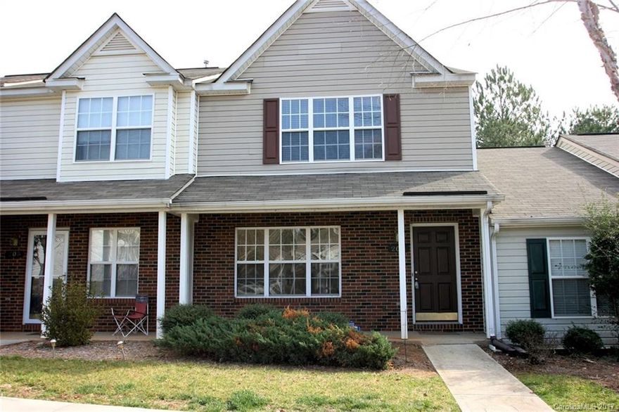 Great townhome in sought after Fort Mill Location! 2 BR/2.5BA, Fresh paint and NEW flooring throughout! NEW Dishwasher. Spacious family room w/corner fireplace. Family room transitions to dining room.  Lovely kitchen w/chef's island and breakfast area. Unit has 2 master suites with walk-in closets. Both bathrooms upstairs feature dual sinks and NEW flooring. Convenient to I-77 to get to Charlotte or Rock Hill. Short walk to community pool. Stop renting and buy today. Unit will not last long!
