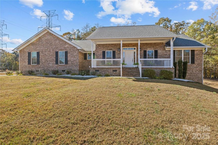 Beautiful brick home situate on 5 acres in the desirable Kingsburry Rd area. Open floor plan with true hardwood flooring throughout. Master bath features a sauna with walk in closet and plenty of shelving. The layout of the home is split bedroom. The kitchen area is open with a large island and plenty of counter space. All appliances remain including washer/dryer. Large front porch to relax or sit in the rear screened in porch perfect for nature watching. The basement is set up with plenty of work tables and is on a separate HVAC. Property has a barn if you have horses or great for storing equipment. Barn has power and water already done. There is a RV building with a 12x12 roll up door and a 3' man door. Property has an open double car shed. Well maintained and alot to see. Come take a look today.