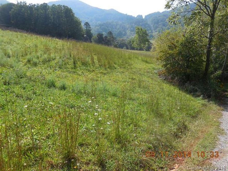 A lovely, easy access, cleared lot, with a gentle slope and good views. Perfect for a double wide or modular home. Perc'd for a 3 bed septic and shared well rights available, call for details.