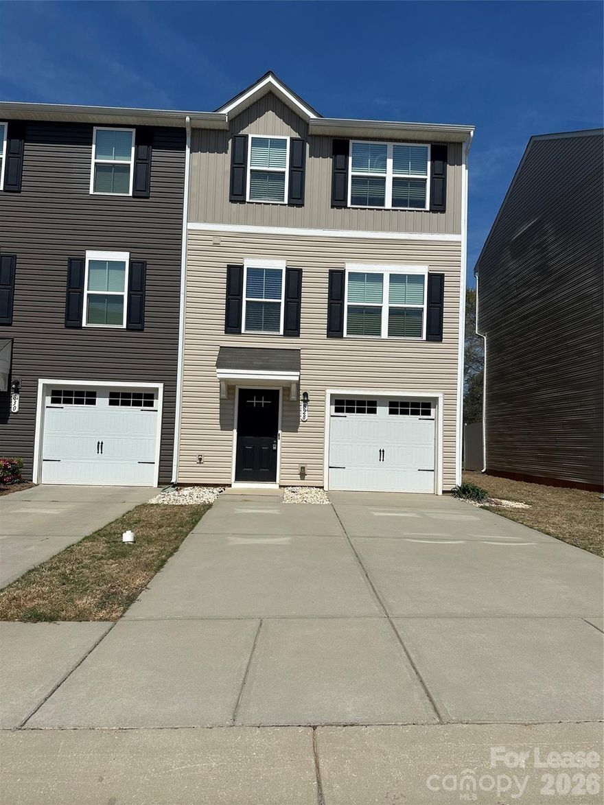 Beautiful 3-bedroom, 2.5-bath townhome in the Glynwood Forest community offering 1,599 square feet of living space across three levels. Built in 2019, this site-built unit features an open-concept main floor with a bright kitchen, spacious living area, and updated interior touches including fresh paint, cleaned carpet, and a new ceiling fan. The upper level includes a primary suite with a private en-suite bath, plus two additional bedrooms that share a full hall bath. One-car attached garage and driveway parking. Located on a small 0.03-acre lot with low-maintenance living and access to a neighborhood playground. Convenient Fort Mill location near I-77, Carowinds Blvd, shopping, dining, and major commuter routes, with zoning for Sugar Creek Elementary, Fort Mill Middle, and Nation Ford High School.