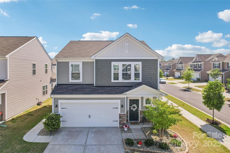 Recently appraised at $475K-a savvy buyer’s opportunity. This isn’t just a deal—it’s the one you’ve been waiting for! Stylish, smart, and ready for real life—this Walnut Creek home delivers. The open layout leads to a bright kitchen with a huge island, farmhouse sink, and statement lighting. The main-level primary suite keeps things easy, and the upstairs loft adds bonus space to relax, work, or play. Step outside to a private fenced yard with an extended patio and side walkway. Smart thermostats, security cameras, and quality upgrades throughout. With a new lower price, it’s a rare chance to get more space, more style, and unbeatable community amenities: two pools, a clubhouse, gym, parks, trails, and events. Conveniently located near Indian Land’s vibrant commercial developments.